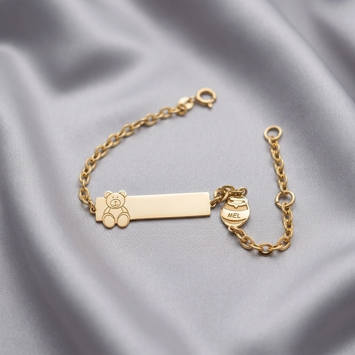 Pulseira infantil de ouro com plaquinha em ouro 18k: Pulseira Plaquinha Urso, da KMS Joias